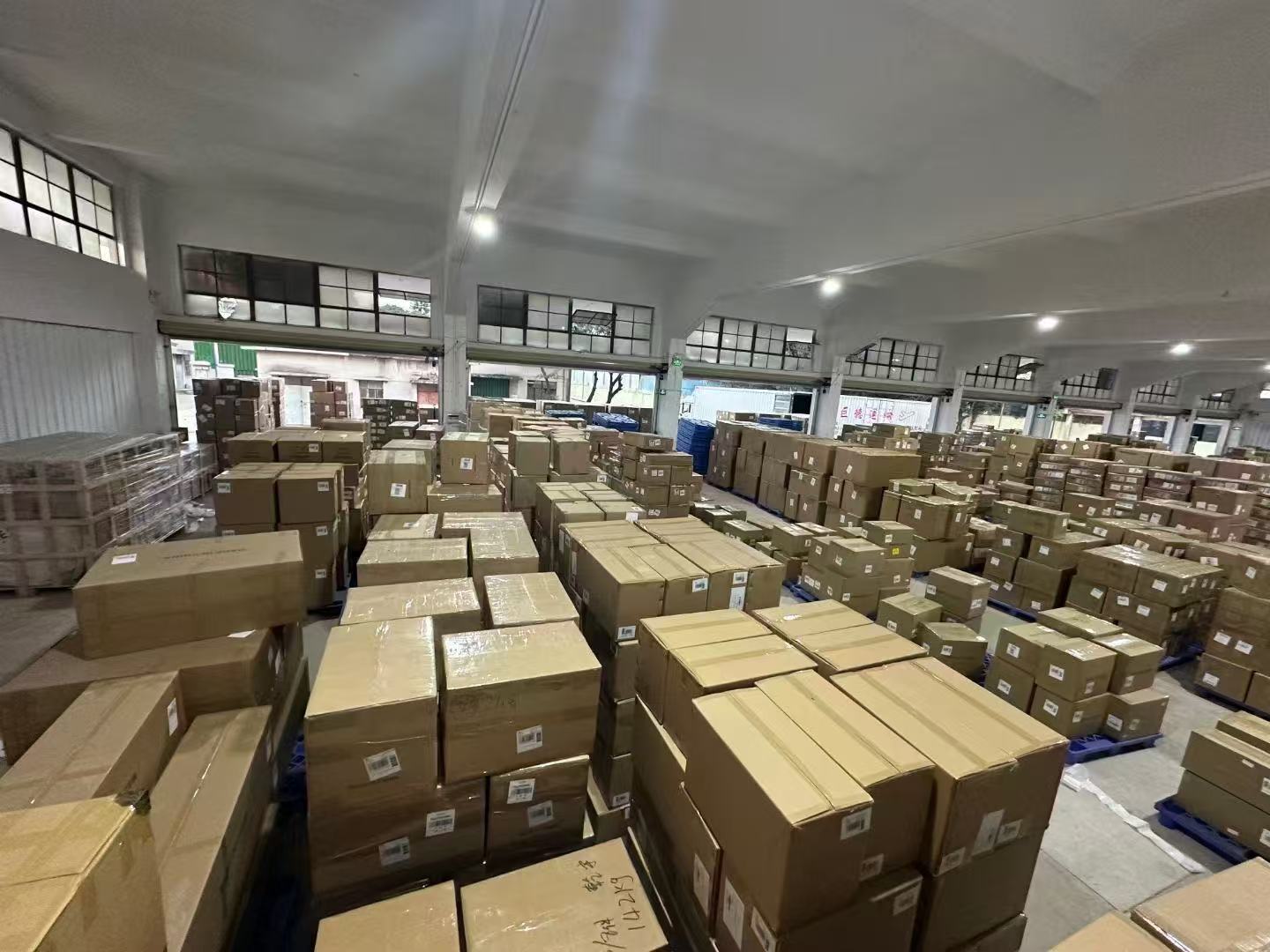 Pallets of packed cartons inside a DropFulfill network partner warehouse in Canada